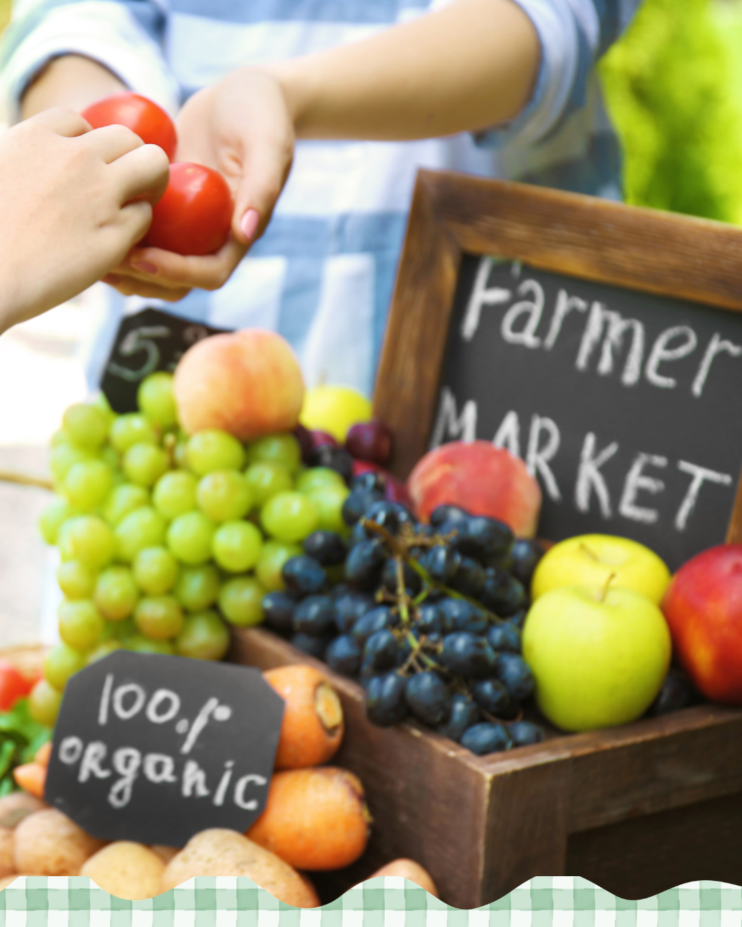 Person handing tomatoes to a shopper at a farmers' market. 